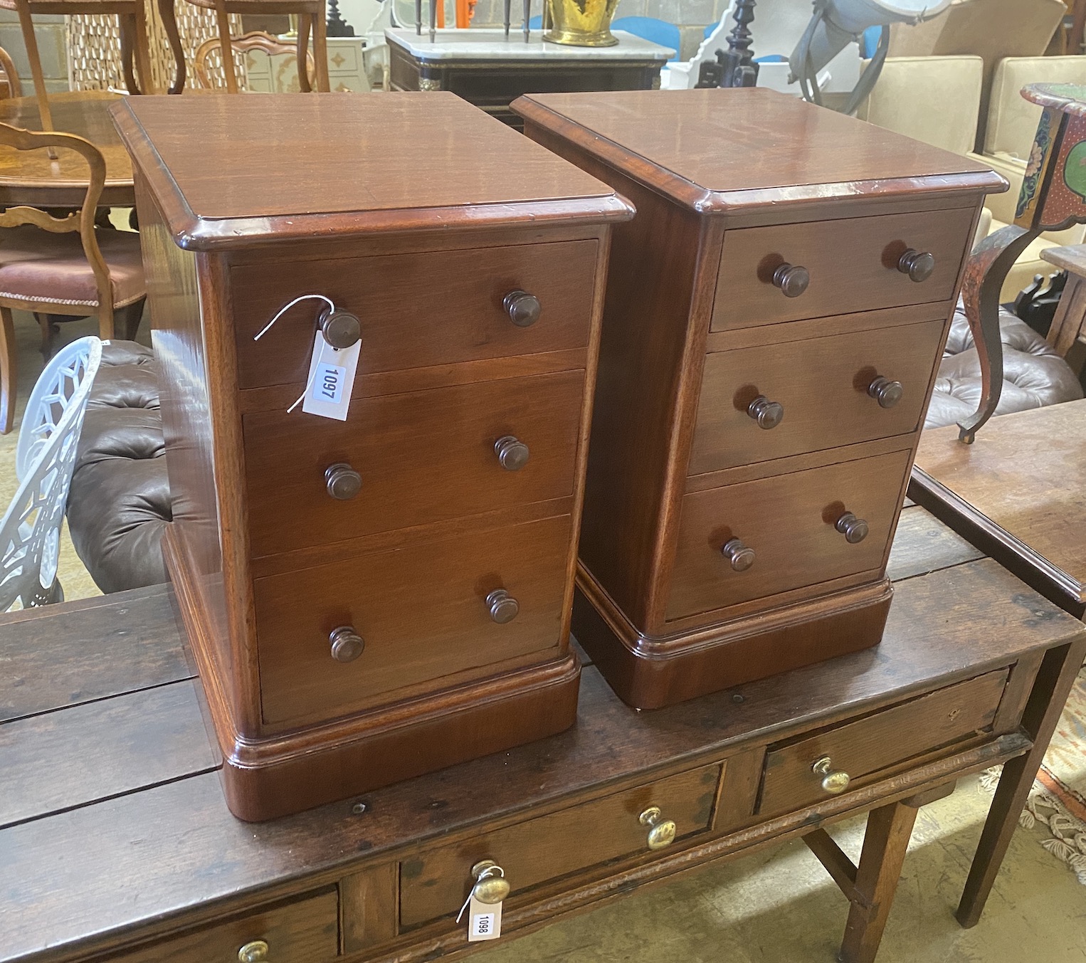 A pair of Victorian and later mahogany three drawer bedside chests, width 38cm, depth 43cm, height 61cm